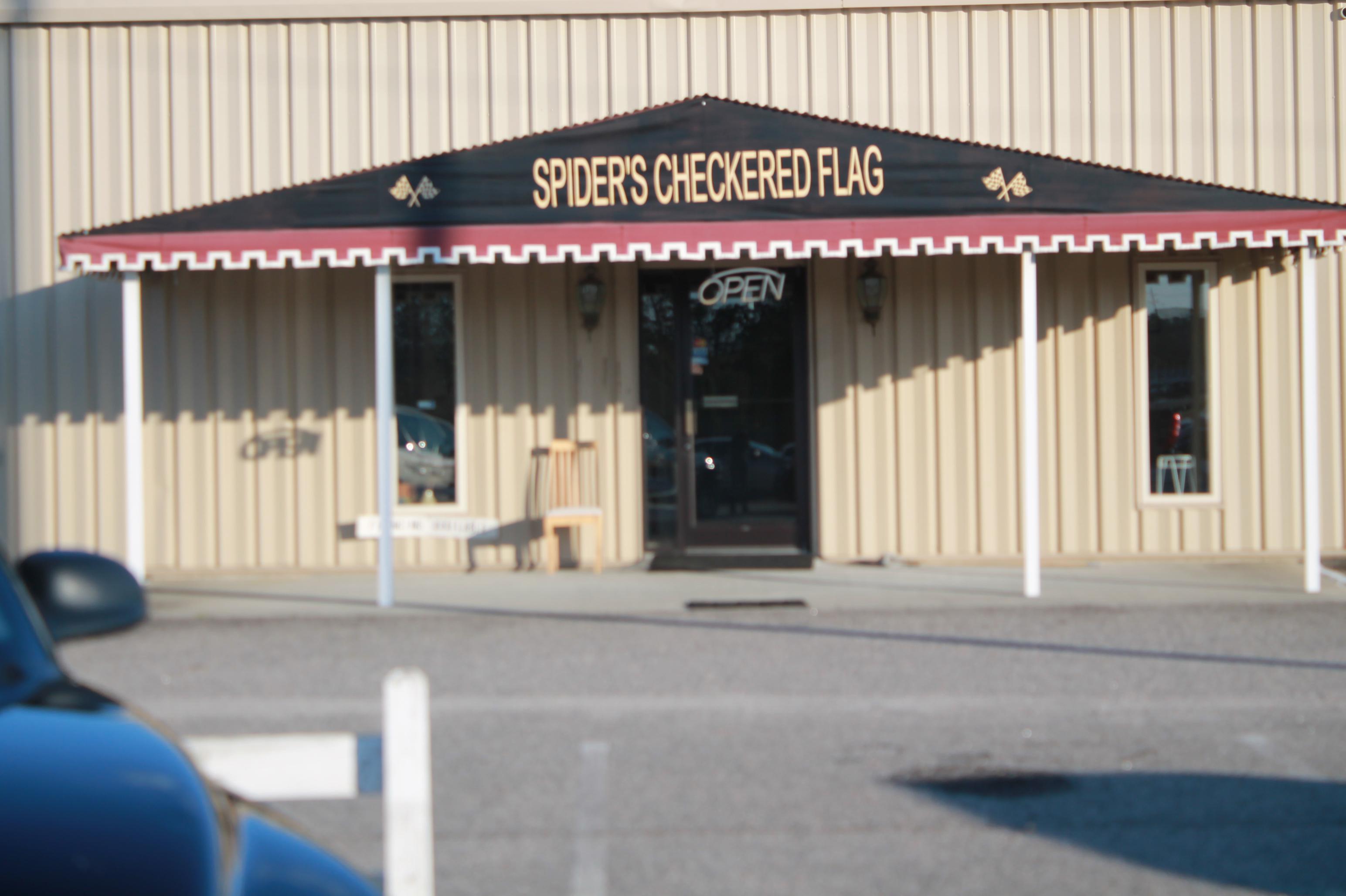 Spider's Checkered Flag Auto Sales Logo