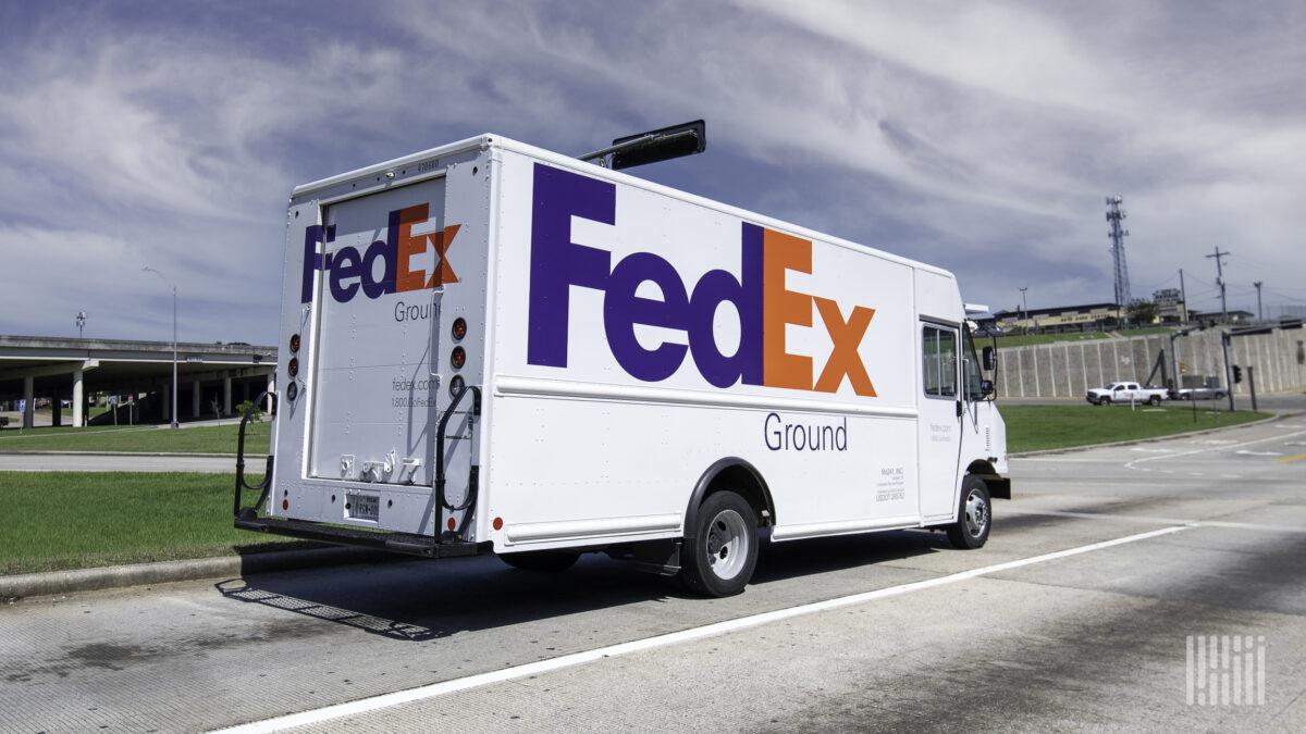 FEDEX COURIER COCHIN Logo